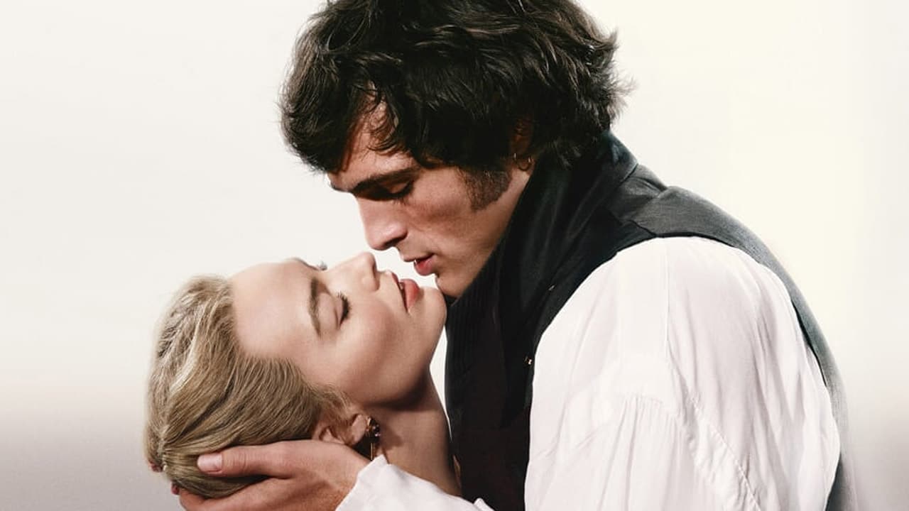 Jacob Elordi's brooding Heathcliff kisses Margot Robbie's Cathy on the poster for Wuthering Heights